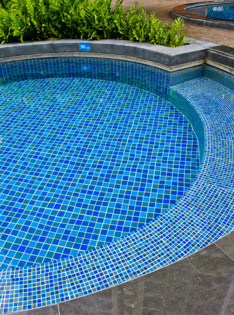 San Diego Pool Tile Cleaning restoring clear pool waterline tile in San Diego, California