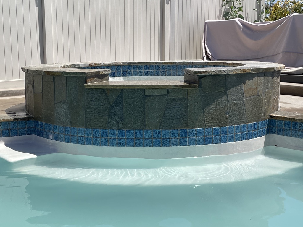 San Diego Pool Tile Cleaning cleaning pool waterline tile in San Diego, California