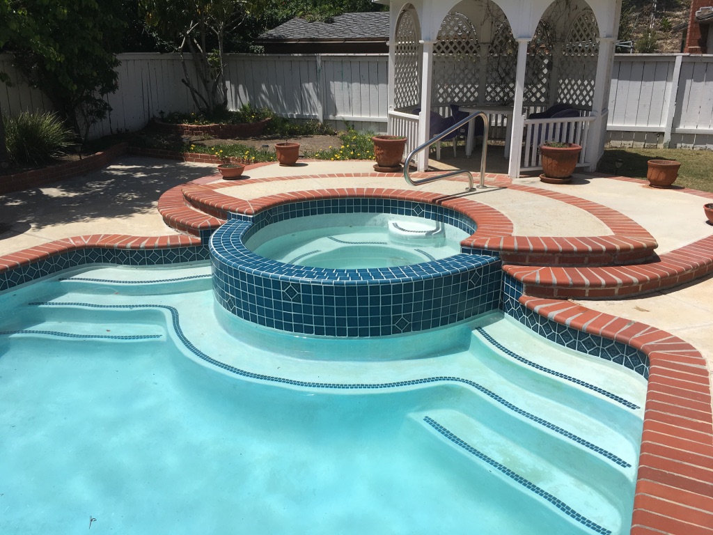 San Diego Pool Tile Cleaning cleaning outdoor pool tile in San Diego, California